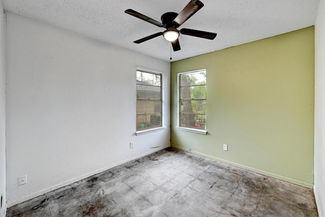 2511 Bitter Creek Dr, Austin, TX 78744 - unfurnished room featuring a ceiling fan, a textured ceiling, and baseboards