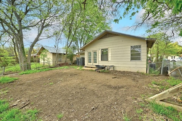 2511 Bitter Creek Dr, Austin, TX 78744 - back of property featuring a fenced backyard