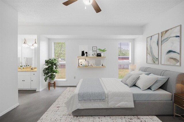 12503 Brandywine Ct, Austin, TX 78727 - bedroom with multiple windows, baseboards, ensuite bathroom, and a ceiling fan