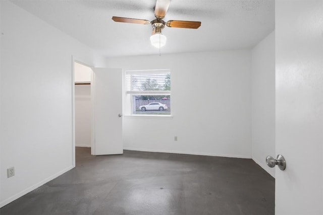 12503 Brandywine Ct, Austin, TX 78727 - empty room featuring concrete flooring, ceiling fan, and baseboards