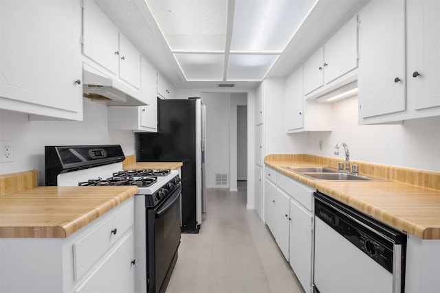 12503 Brandywine Ct, Austin, TX 78727 - kitchen with white dishwasher, black range with gas cooktop, a sink, extractor fan, and white cabinets