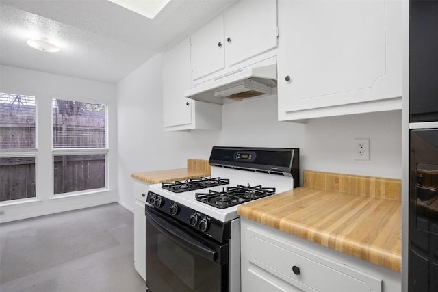 12503 Brandywine Ct, Austin, TX 78727 - kitchen with range with gas cooktop, under cabinet range hood, white cabinetry, and light countertops