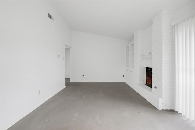 12503 Brandywine Ct, Austin, TX 78727 - unfurnished living room featuring finished concrete flooring, a fireplace, and lofted ceiling