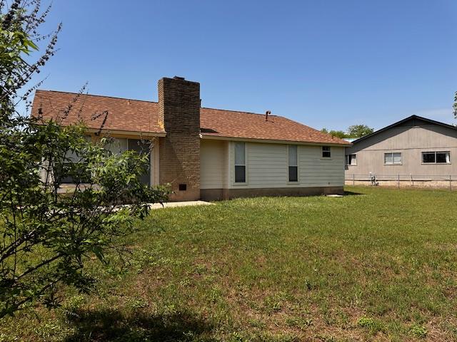 12503 Brandywine Ct, Austin, TX 78727 - back of house featuring a chimney