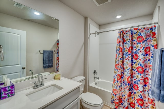 312 Heatherwood Ter, Marble Falls, TX 78654 - full bathroom with shower / bath combo, visible vents, toilet, and vanity