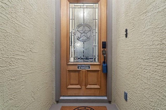510 N Horseshoe Bay Blvd, Horseshoe Bay, TX 78657 - view of exterior entry featuring stucco siding