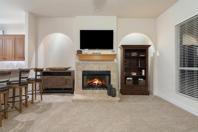 510 N Horseshoe Bay Blvd, Horseshoe Bay, TX 78657 - living area with carpet flooring and a fireplace