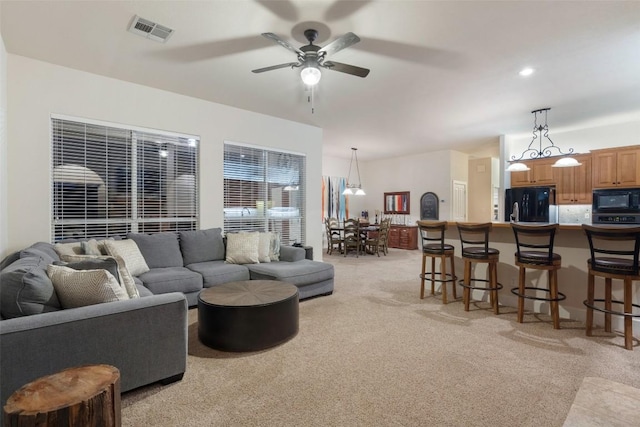 510 N Horseshoe Bay Blvd, Horseshoe Bay, TX 78657 - living area featuring light colored carpet and a ceiling fan