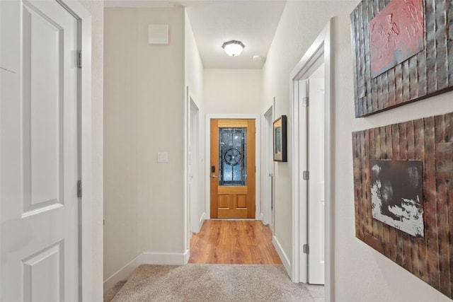510 N Horseshoe Bay Blvd, Horseshoe Bay, TX 78657 - doorway to outside featuring carpet floors and baseboards
