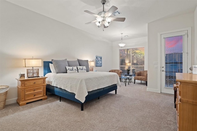510 N Horseshoe Bay Blvd, Horseshoe Bay, TX 78657 - bedroom featuring access to exterior, light carpet, baseboards, and a ceiling fan