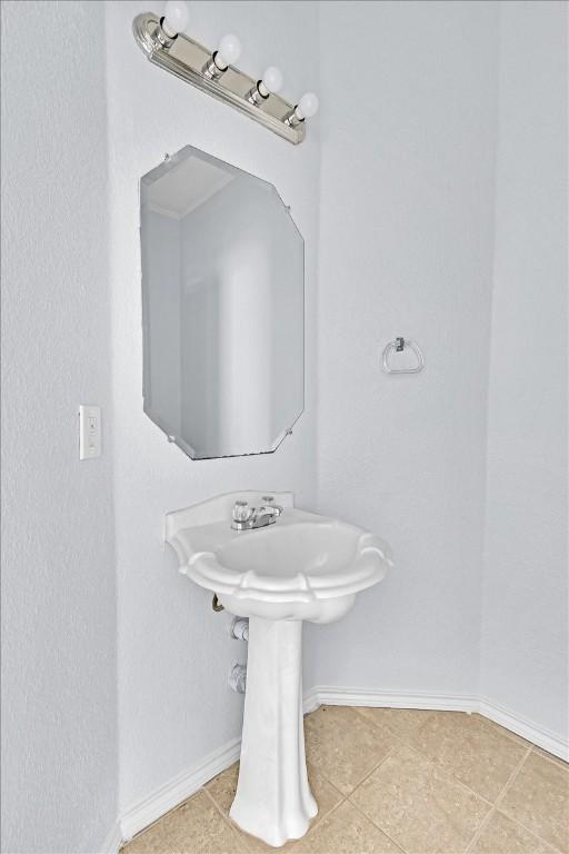 16101 Mcdows Hole Ln, Austin, TX 78717 - bathroom featuring baseboards and tile patterned flooring