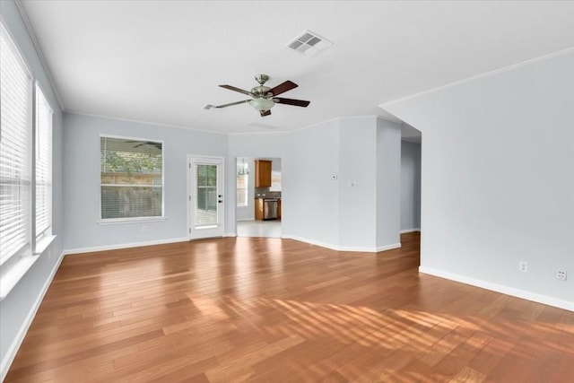 16101 Mcdows Hole Ln, Austin, TX 78717 - unfurnished living room featuring a ceiling fan, baseboards, and wood finished floors