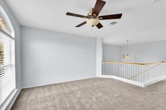 16101 Mcdows Hole Ln, Austin, TX 78717 - spare room with carpet floors and a ceiling fan
