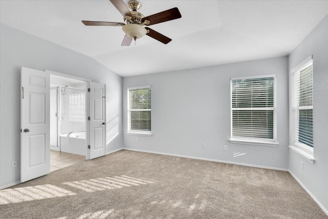 16101 Mcdows Hole Ln, Austin, TX 78717 - unfurnished bedroom with carpet floors, lofted ceiling, ensuite bathroom, and ceiling fan
