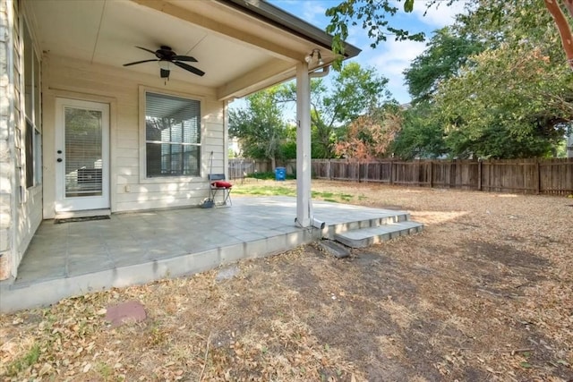 16101 Mcdows Hole Ln, Austin, TX 78717 - fenced backyard featuring ceiling fan and a patio area