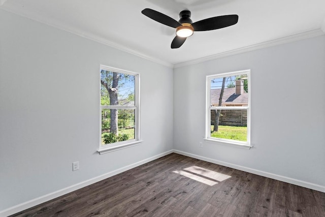 unfurnished room featuring dark wood-style floors, crown molding, ceiling fan, and baseboards