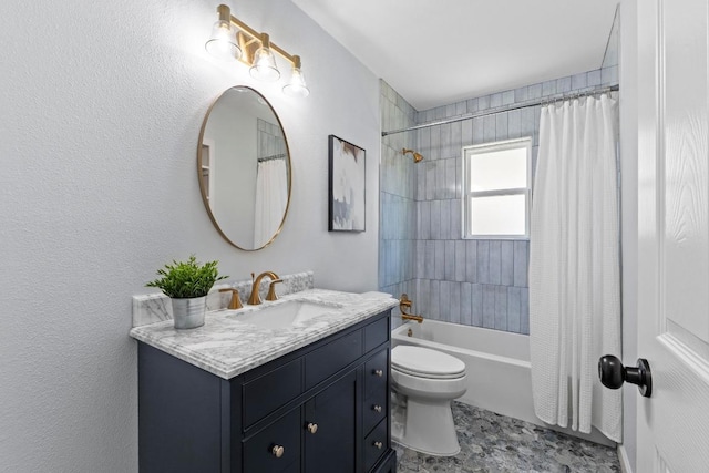 full bath featuring shower / bath combo with shower curtain, vanity, and toilet