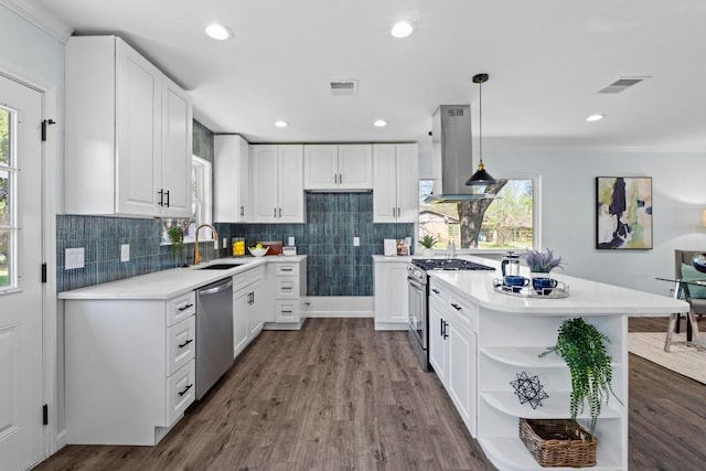 kitchen with open shelves, stainless steel appliances, island exhaust hood, a sink, and visible vents