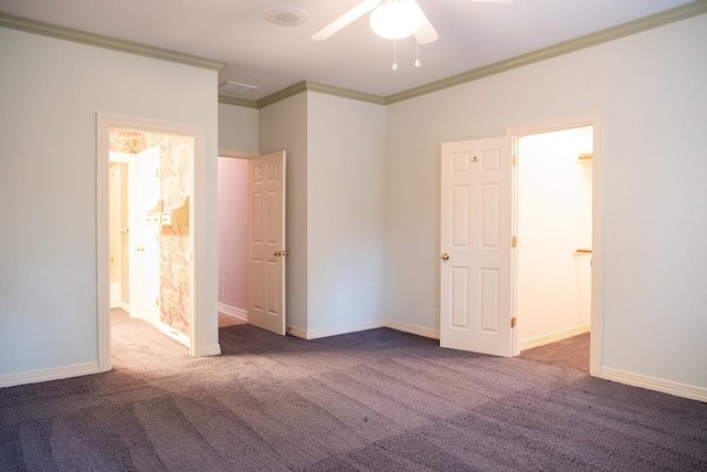 unfurnished bedroom featuring ornamental molding, baseboards, carpet floors, a ceiling fan, and ensuite bathroom