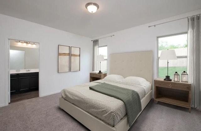 309 Enforcer Loop, Jarrell, TX 76537 - bedroom with carpet, baseboards, connected bathroom, and a sink
