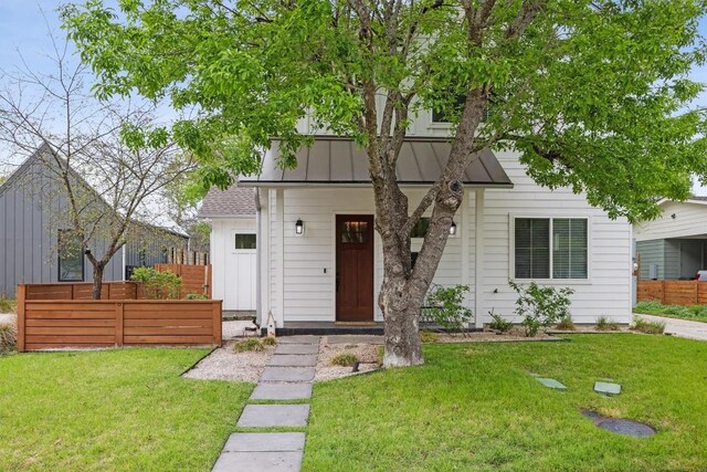 1506 Payne Ave Unit A, Austin, TX 78757 - view of front of house featuring a standing seam roof