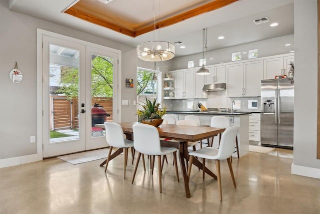 1506 Payne Ave Unit A, Austin, TX 78757 - dining space with french doors, a raised ceiling, recessed lighting, a chandelier, and baseboards