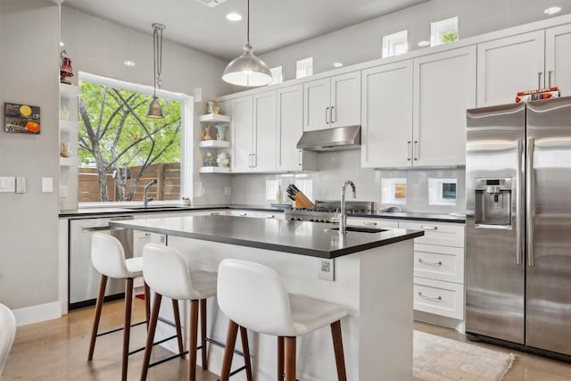 1506 Payne Ave Unit A, Austin, TX 78757 - kitchen featuring stainless steel appliances, open shelves, a sink, under cabinet range hood, and dark countertops