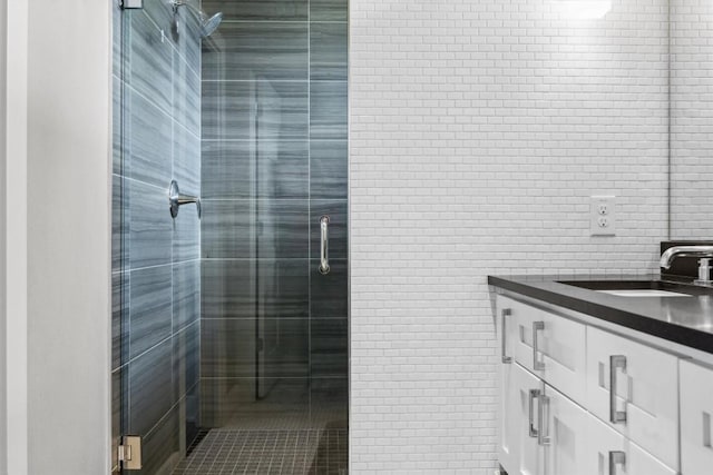 1506 Payne Ave Unit A, Austin, TX 78757 - bathroom with tile walls, vanity, a stall shower, and tile patterned flooring