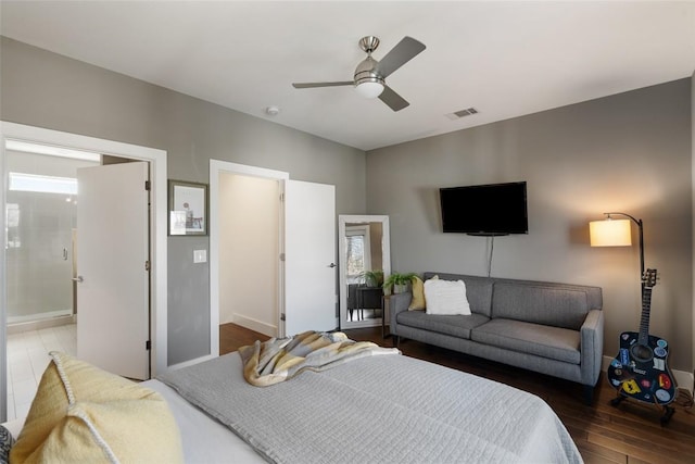 2514 E 4th St Unit A, Austin, TX 78702 - bedroom featuring wood finished floors, a ceiling fan, and ensuite bathroom