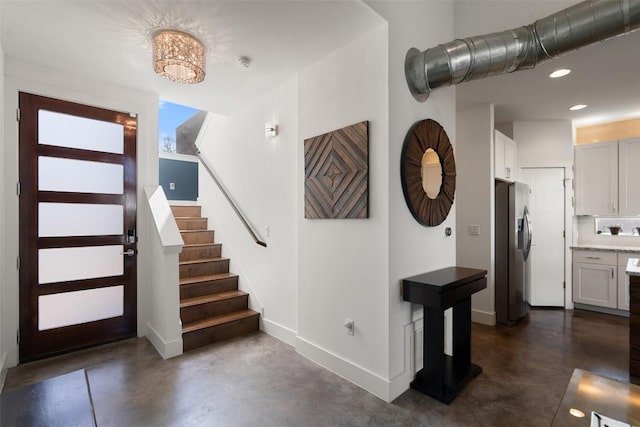 2514 E 4th St Unit A, Austin, TX 78702 - foyer with concrete flooring, stairs, and recessed lighting