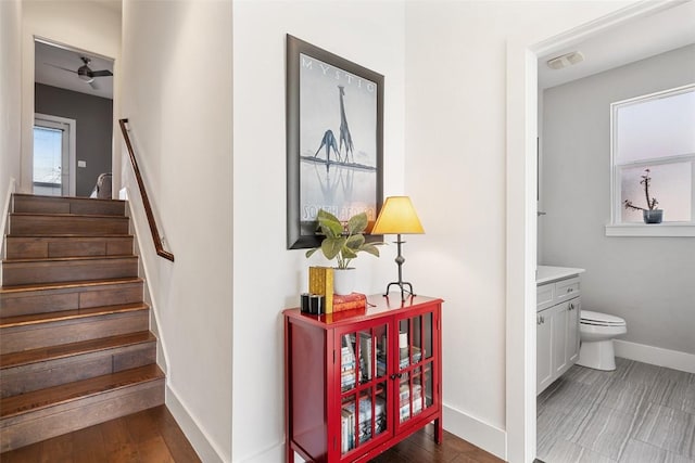 2514 E 4th St Unit A, Austin, TX 78702 - stairway featuring baseboards