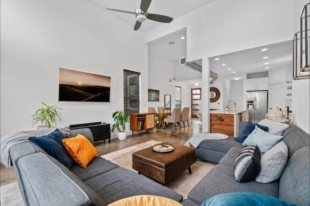 2514 E 4th St Unit A, Austin, TX 78702 - living area with a ceiling fan, recessed lighting, and a high ceiling