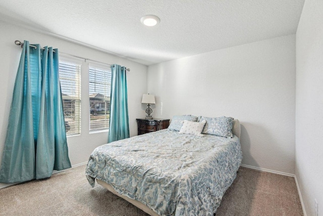759 Ocelot Ct, Seguin, TX 78155 - bedroom featuring carpet floors and a textured ceiling