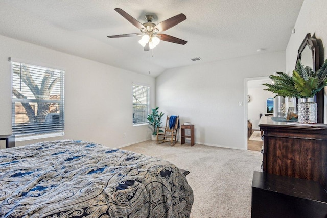 759 Ocelot Ct, Seguin, TX 78155 - bedroom featuring light colored carpet, a textured ceiling, and ceiling fan
