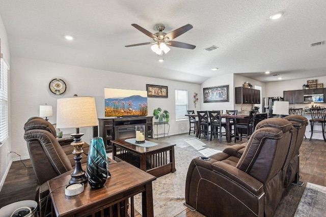 759 Ocelot Ct, Seguin, TX 78155 - living room featuring ceiling fan, wood finished floors, vaulted ceiling, and recessed lighting