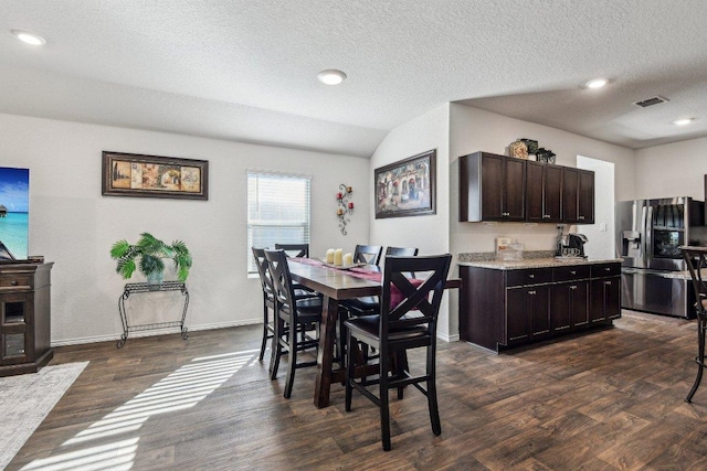 759 Ocelot Ct, Seguin, TX 78155 - dining room featuring dark wood finished floors, recessed lighting, and a textured ceiling