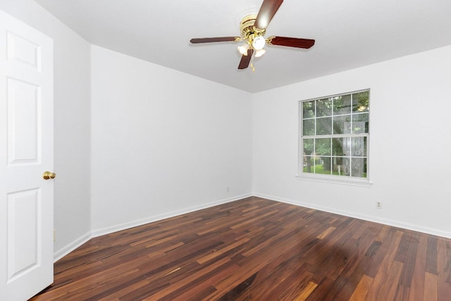 1103 Vanderbilt Cir, Pflugerville, TX 78660 - empty room featuring dark wood-style flooring and a ceiling fan