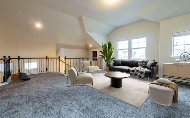 living room with carpet, lofted ceiling, and baseboard heating