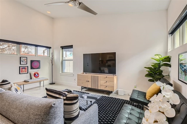 2012 Willow St Unit B, Austin, TX 78702 - living room with a high ceiling, ceiling fan, and baseboards