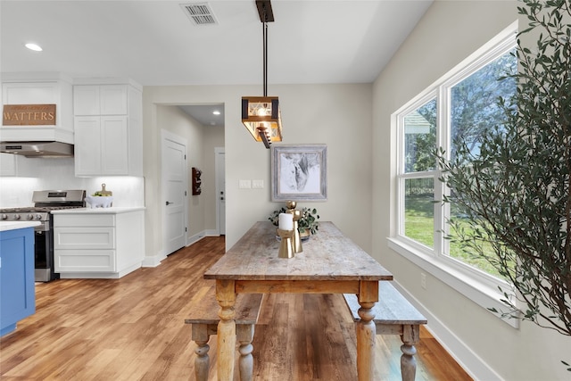 414 Wesley Ridge Dr, Spicewood, TX 78669 - dining room with light wood finished floors, plenty of natural light, and recessed lighting