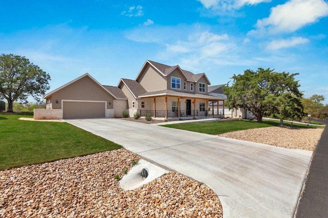 414 Wesley Ridge Dr, Spicewood, TX 78669 - view of front of property featuring a porch, driveway, a front lawn, a garage, and stone siding