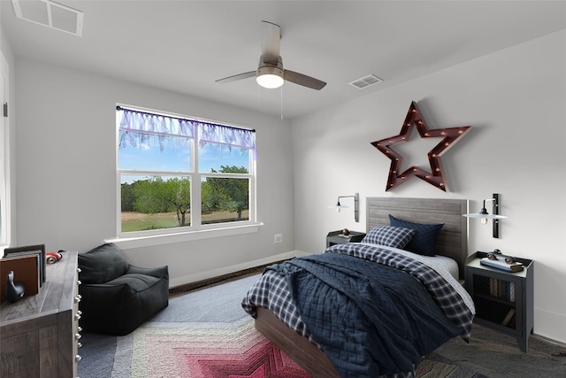 414 Wesley Ridge Dr, Spicewood, TX 78669 - carpeted bedroom featuring baseboards and a ceiling fan