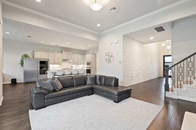 308 Highland Village Cv, Austin, TX 78738 - living area featuring dark wood-style floors, stairs, recessed lighting, baseboards, and crown molding
