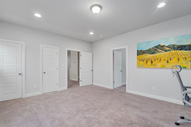 308 Highland Village Cv, Austin, TX 78738 - unfurnished bedroom with carpet, recessed lighting, and baseboards