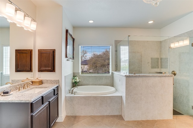 334 Sapling Dr, Driftwood, TX 78619 - bathroom with a bath, tile patterned flooring, vanity, walk in shower, and recessed lighting