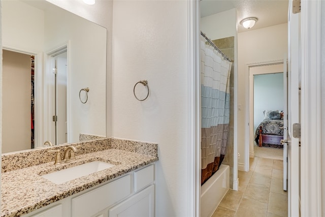 334 Sapling Dr, Driftwood, TX 78619 - bathroom with vanity, tile patterned floors, and shower / bathtub combination with curtain