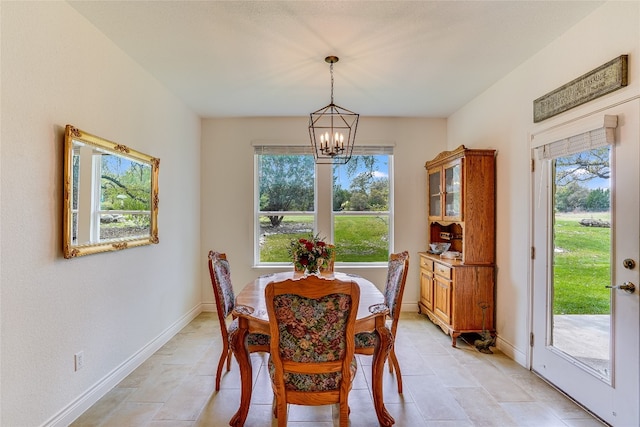 334 Sapling Dr, Driftwood, TX 78619 - dining room featuring a chandelier and light tile patterned floors