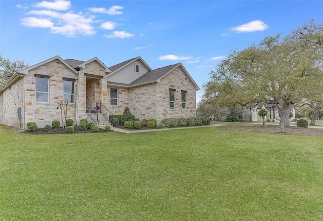 334 Sapling Dr, Driftwood, TX 78619 - view of front facade with stone siding and a front yard