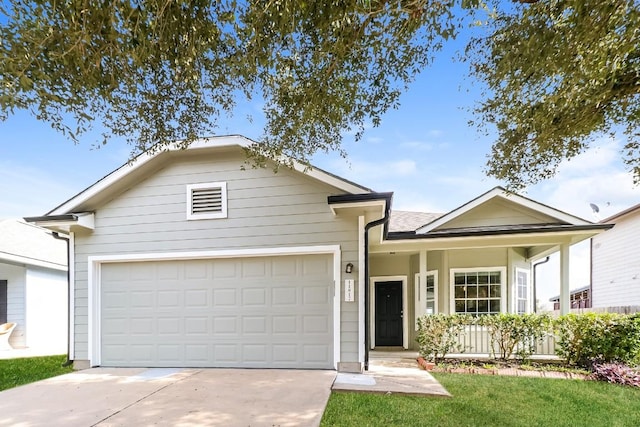 11817 Bastrop St, Manor, TX 78653 - single story home with concrete driveway, a garage, and a porch