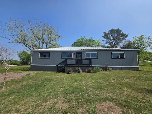 507 W 1st St, Flatonia, TX 78941 - manufactured / mobile home with a front lawn and a metal roof